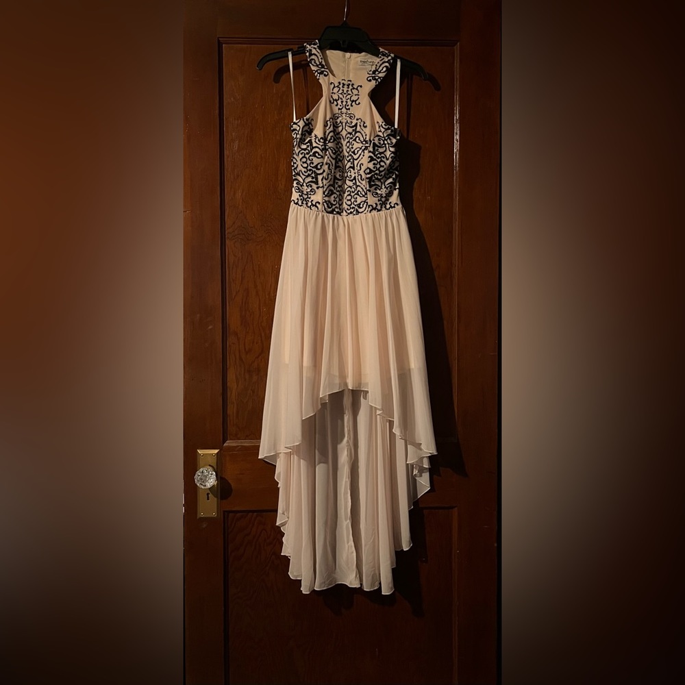 Beautiful semi backless dress, only worn a few times but never out, light pink